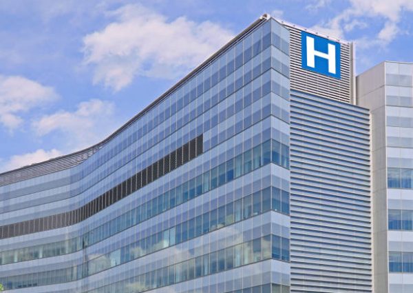 Building with large H sign for hospital